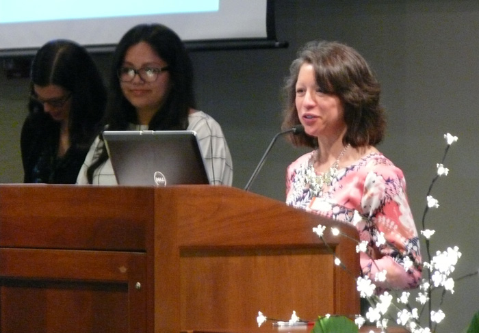 Dr. Lara-Cinisomo presenting Libeth Rosas with the William H. Creswell Graduate Student Award